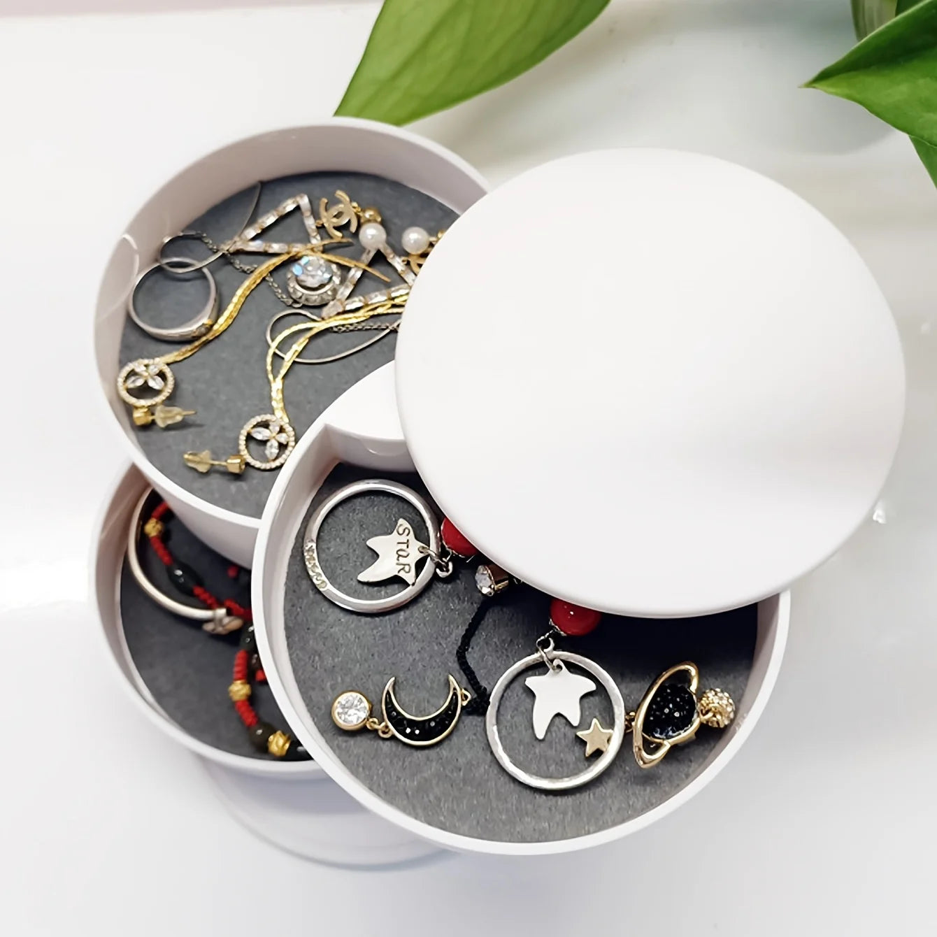 Boîte à bijoux rotative à étages